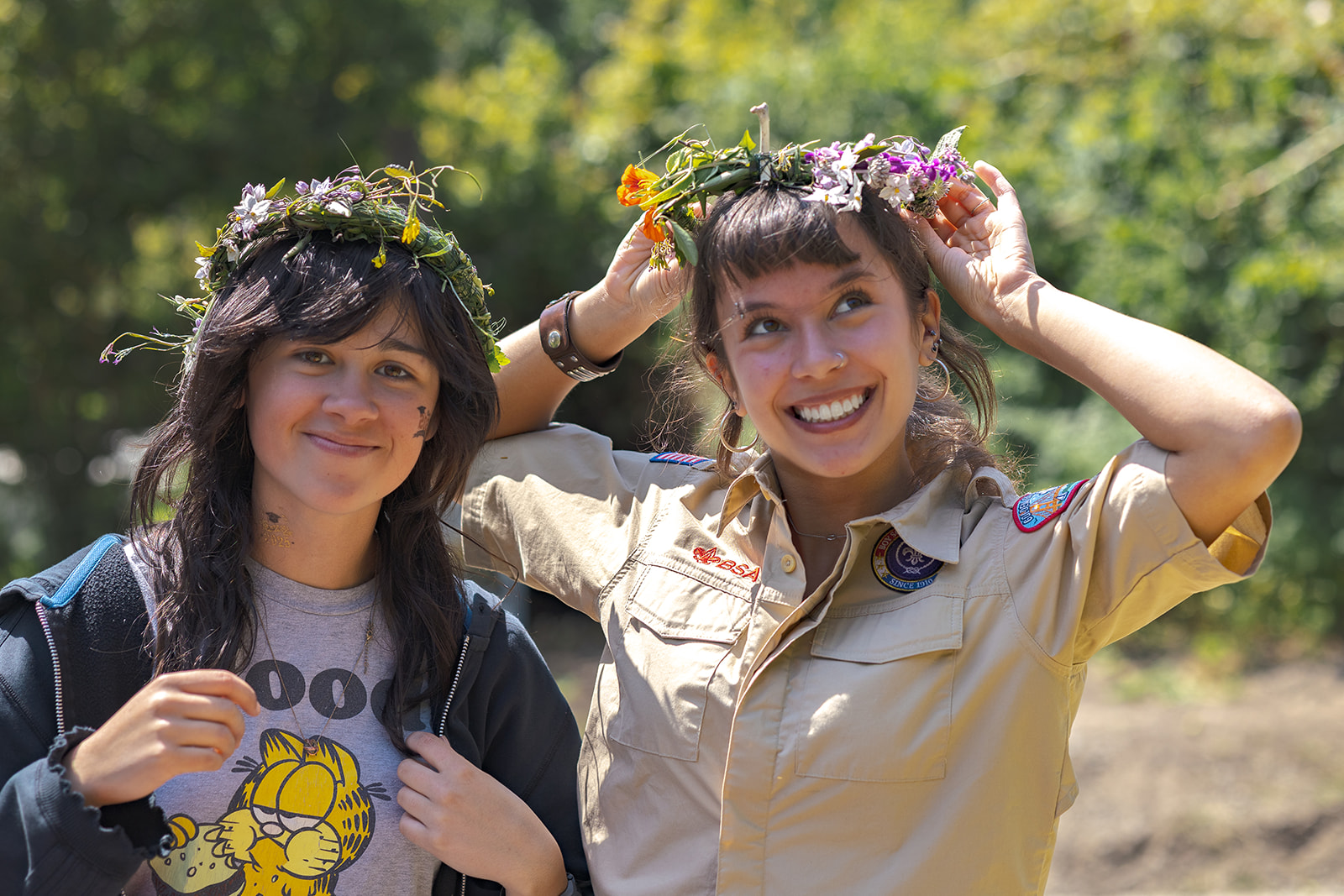 Two girls posing with flower crowns at Slide Ranch in Muir Beach, CA.