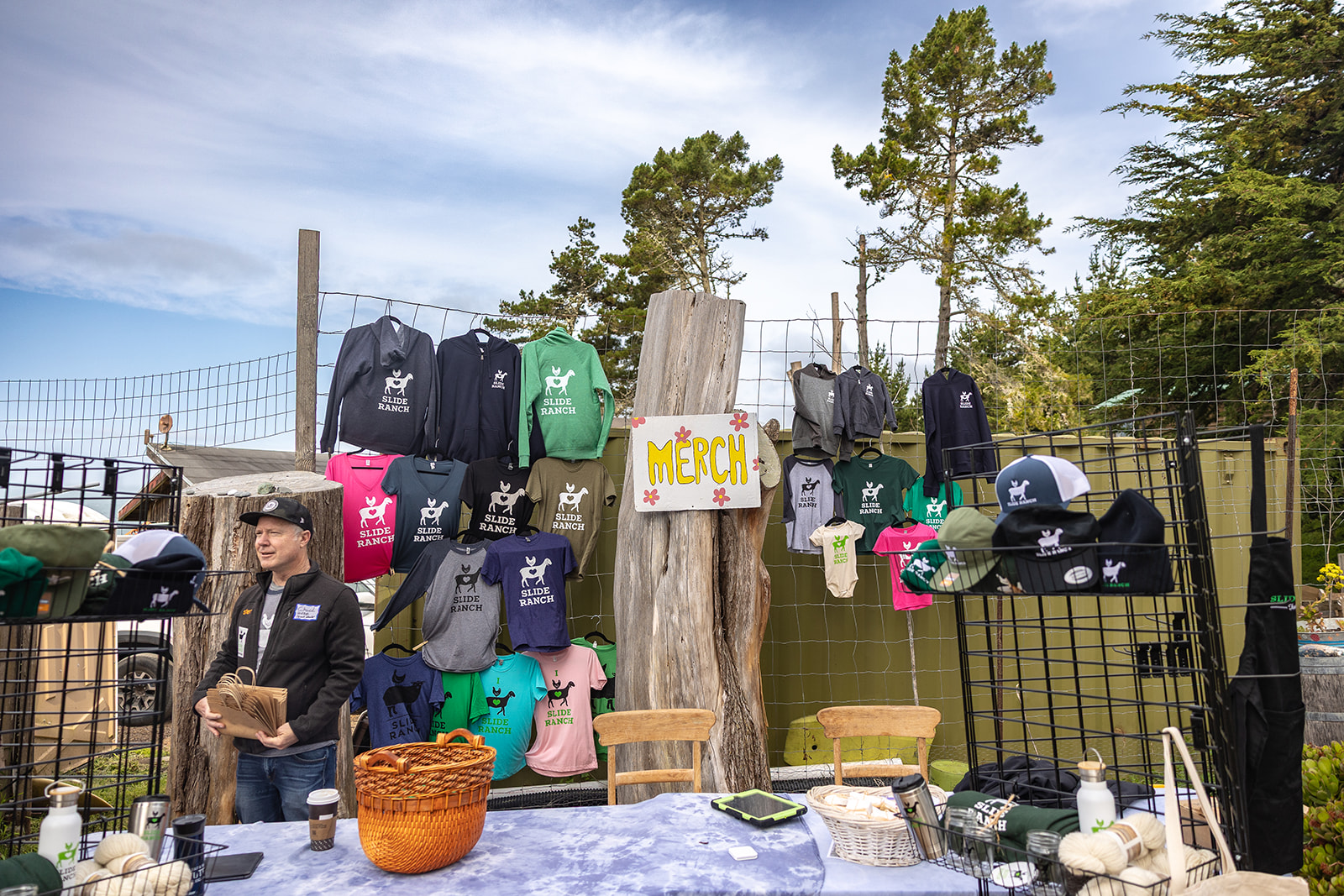 Slide Rach merch station.