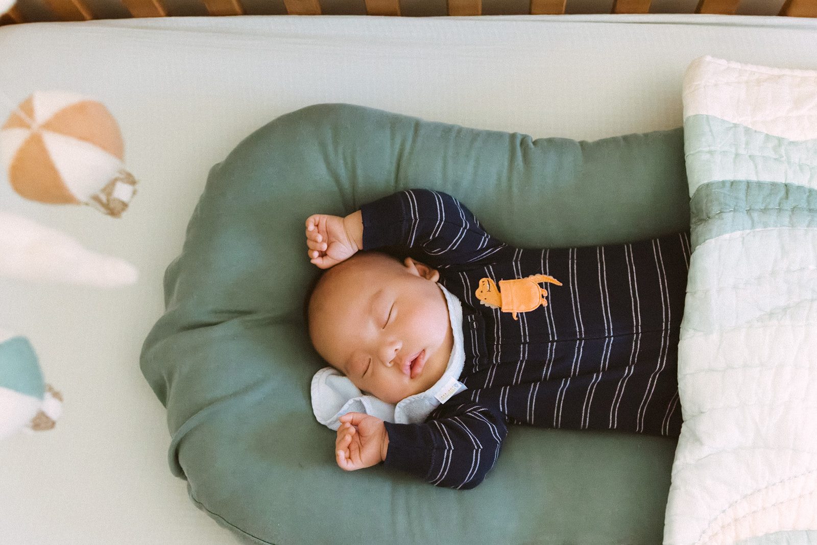 Baby sleeping during an at-home Bay Area newborn photography session.