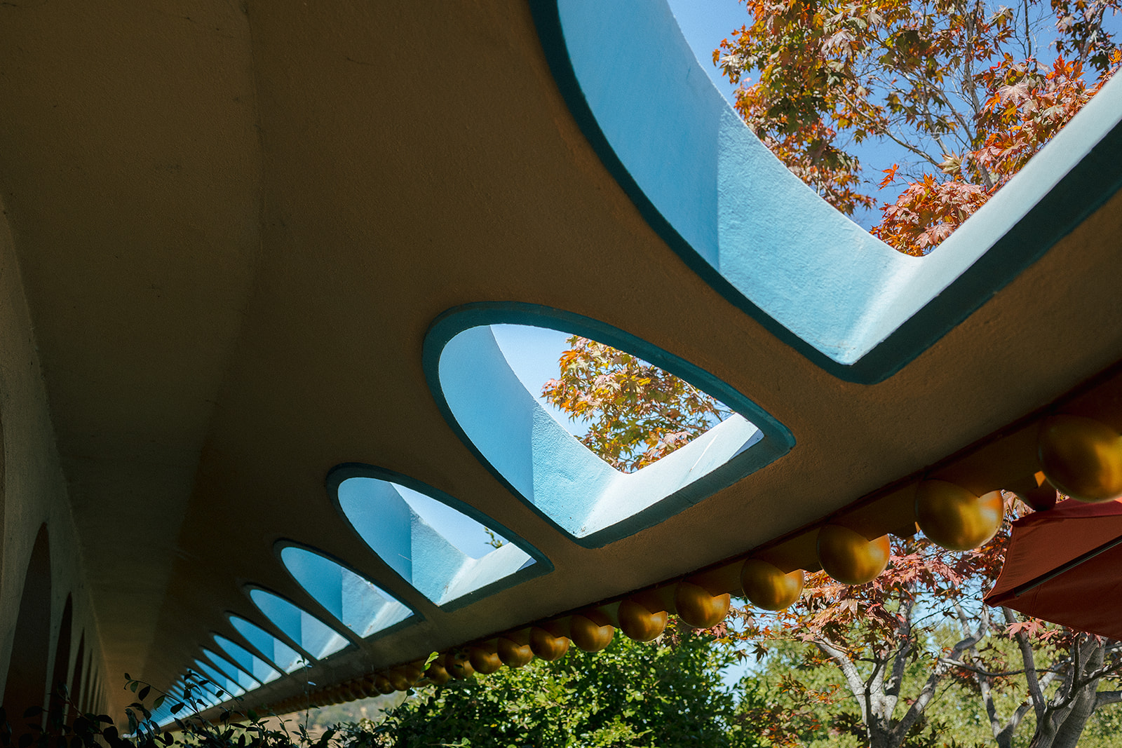 Architectural detail photo of blue skylights and gold accents at Marin County Civic Center.