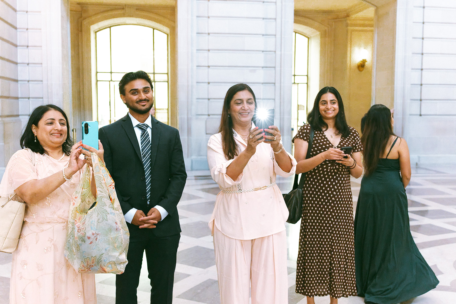 Family and friends waiting inside before the wedding ceremony.